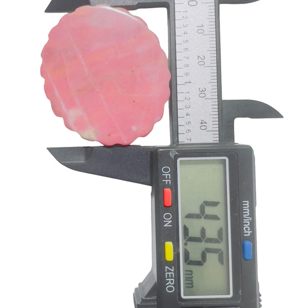 Natural rhodonite healing crystal with carved magical girl pattern