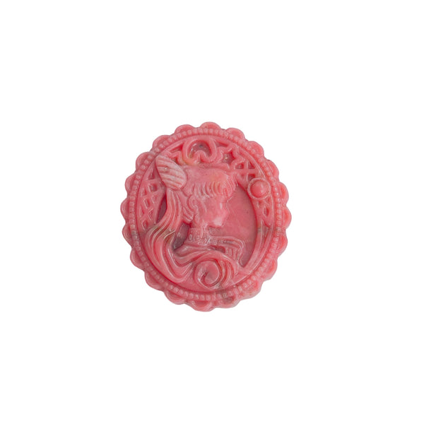 Full view of pink rhodonite healing crystal unicorn carved medallion
