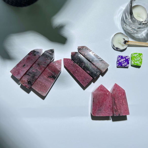 Rhodonite Tower crystals with emotional healing properties for metaphysical shops
