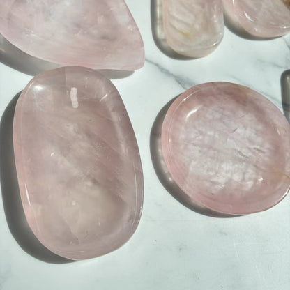 Rose quartz bowl being used for crystal grid healing arrangement