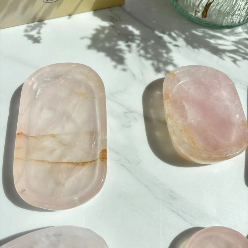 Rose quartz crystal bowl in peaceful meditation setting