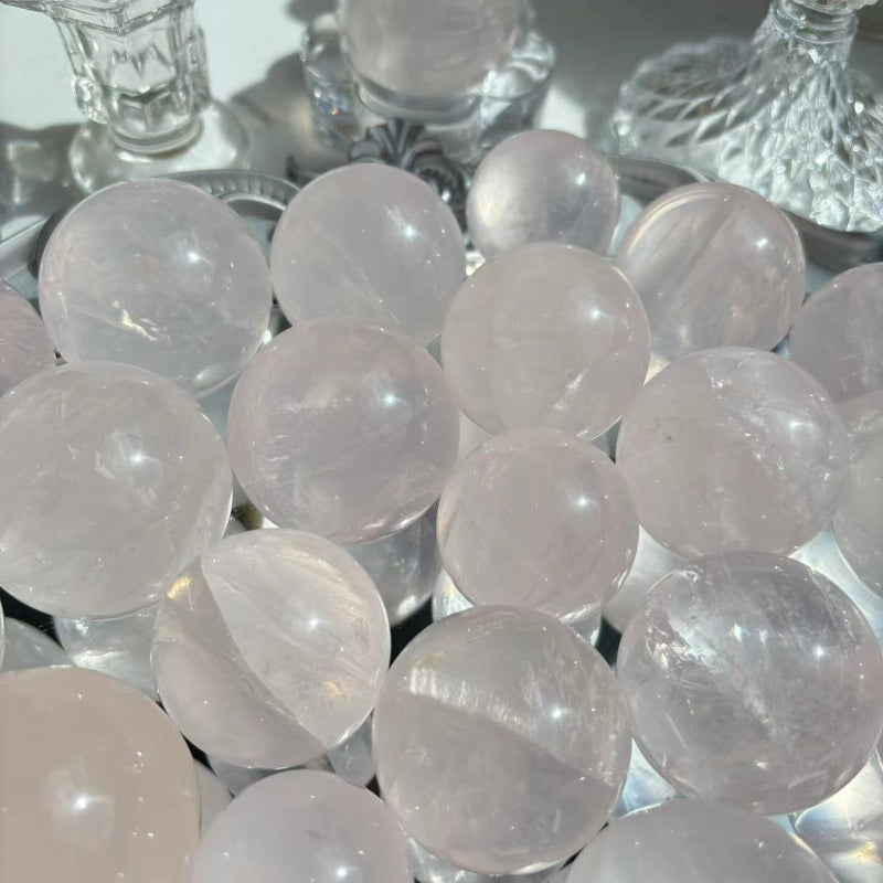 Light Refraction Through Natural Rose Quartz Crystal Sphere