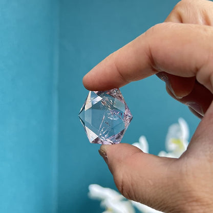 Sacred geometry fluorite crystal carving with perfect symmetry