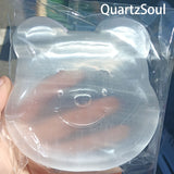 Collection of selenite bear crystal carvings for wholesale buyers