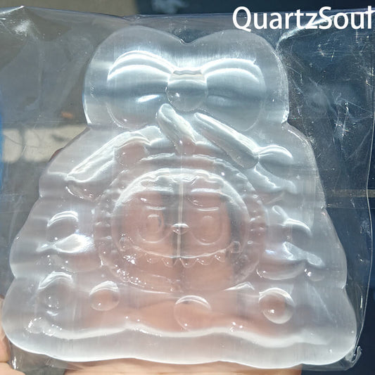 Handcrafted selenite crystal bunny carving with bow tie design