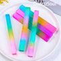 Vibrant palm-sized selenite crystal with rainbow hues for spiritual healing
