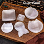 Round selenite crystal palm stone for harmonious energy and meditation