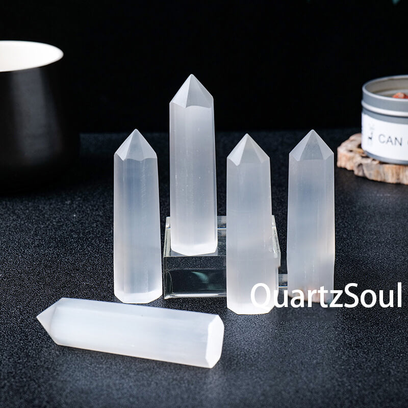 Single pointed hexagonal prism selenite crystal showcasing natural white quartz mineral