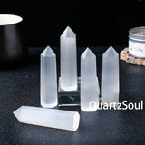 Single pointed hexagonal prism selenite crystal showcasing natural white quartz mineral