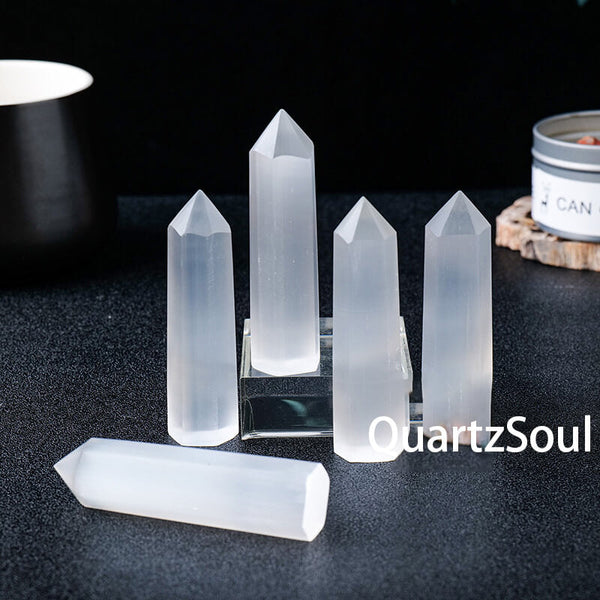 Single pointed hexagonal prism selenite crystal showcasing natural white quartz mineral