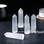 Single pointed hexagonal prism selenite crystal showcasing natural white quartz mineral