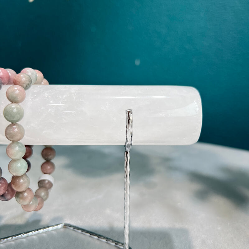 Silver base Clear Quartz bracelet holder stand at angle with jewelry
