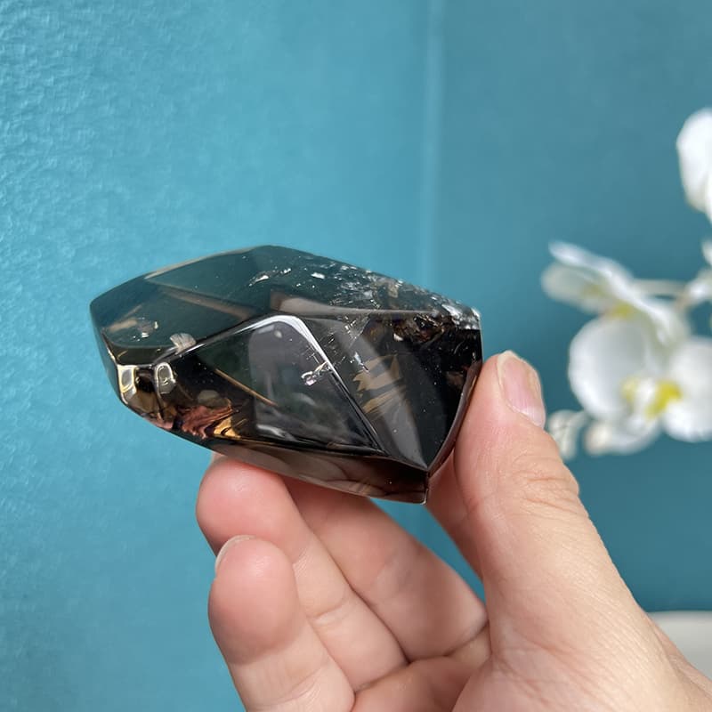 Smoky quartz free form crystal showcasing natural inclusions and smoky coloration