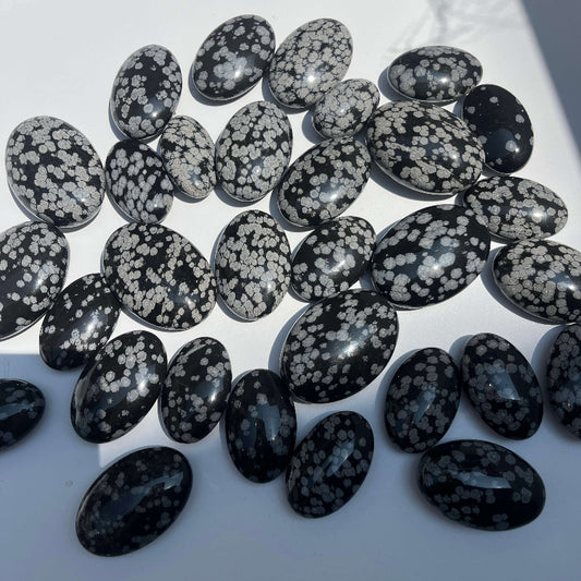 Premium Snow Obsidian Palm Stone for Wholesale Crystal Suppliers