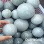 Premium Strawberry Quartz crystal spheres available for wholesale crystal suppliers