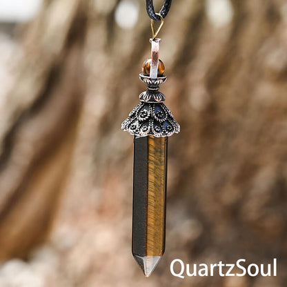 Tiger eye hexagonal crystal pendulum with ornate metalwork