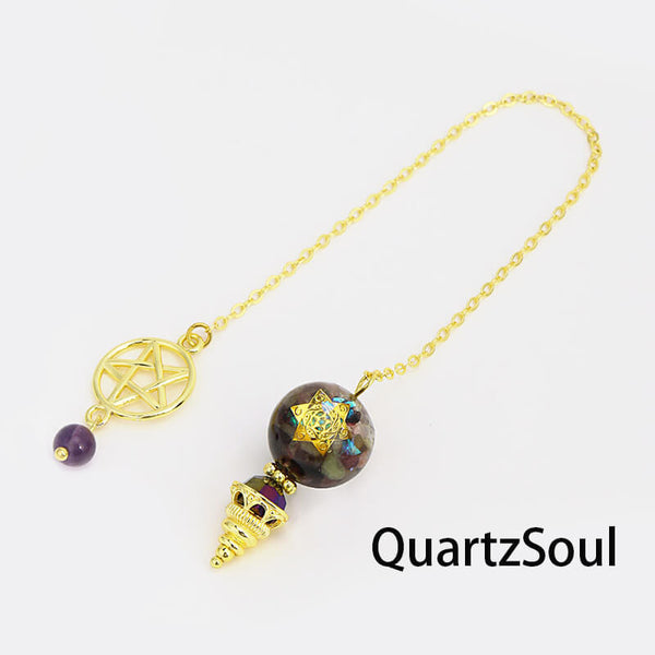 Colorful tourmaline crystal pendulum with pentagram charm for chakra divination
