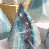 Trolleite crystal point with polished base for display