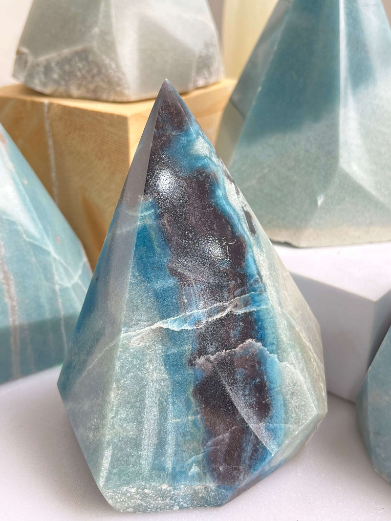Trolleite crystal point with polished base for display