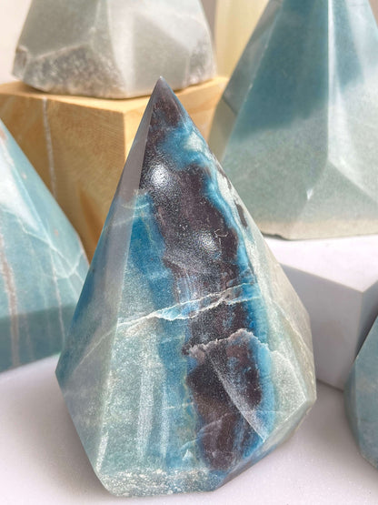 Trolleite crystal point with polished base for display