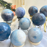 Light Reflection Properties of Polished Trolleite Crystal Sphere