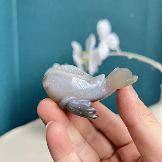Handcrafted white agate crystal dolphin carving with translucent finish
