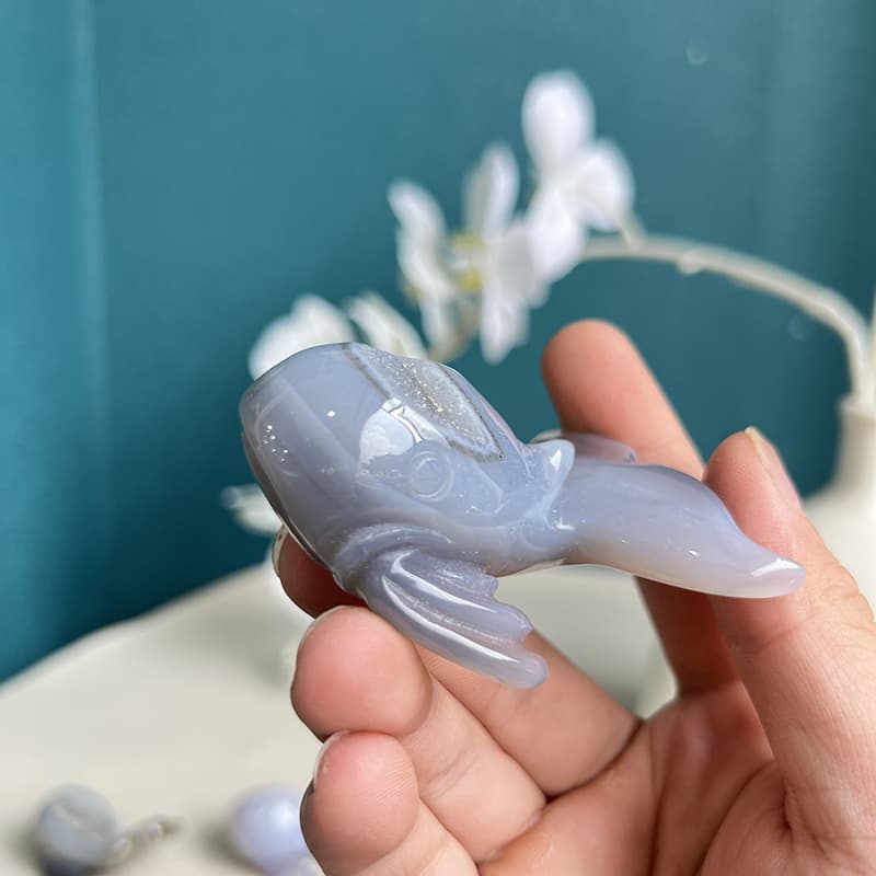 White agate crystal whale carving showing detailed craftsmanship