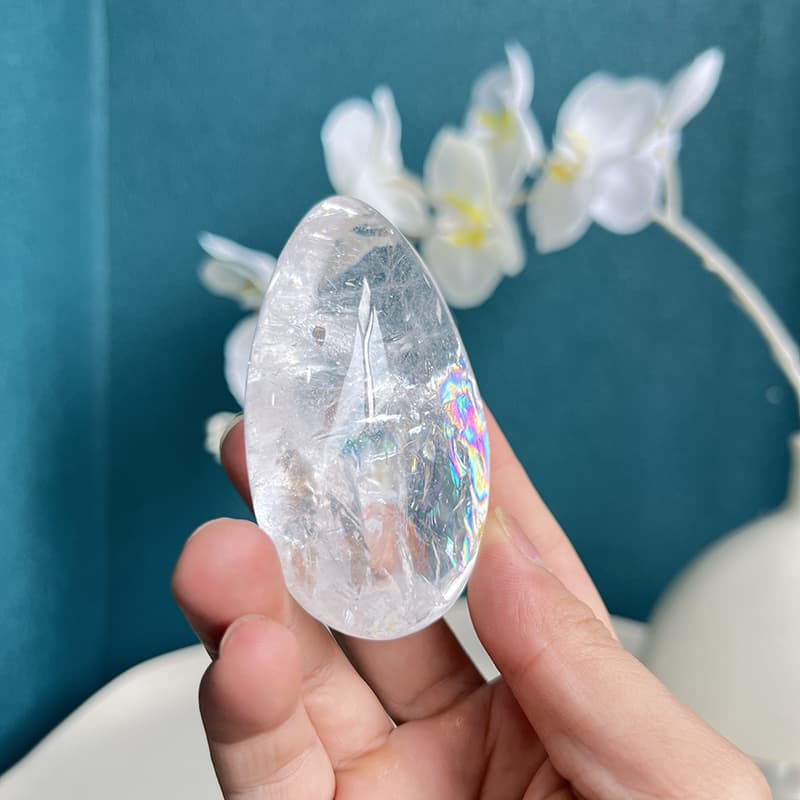 White Smoky Quartz Crystal Egg on Light Stand Showing Transparency