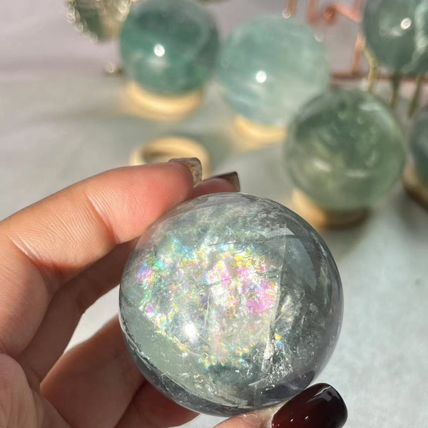 Wholesale collection of light green fluorite crystal spheres