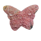 Display arrangement of rhodonite butterfly carvings for wholesale crystal suppliers