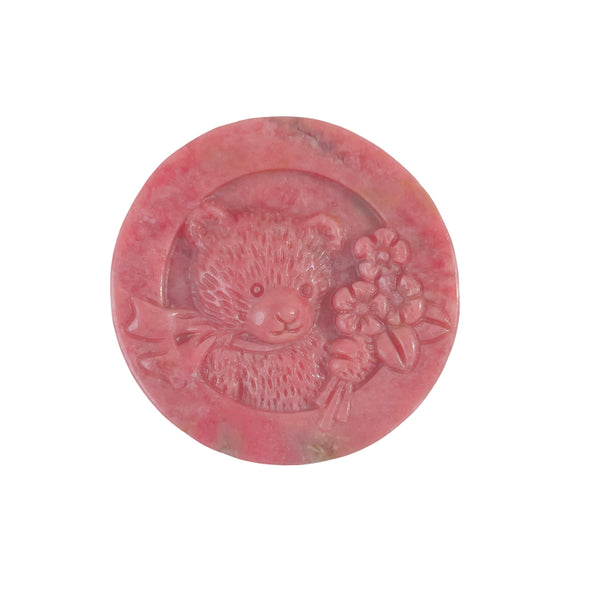  Close-up of rhodonite bear carving showing intricate stone detail work