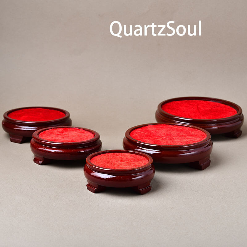 Wooden crystal ball stands in multiple sizes for displaying spheres and minerals
