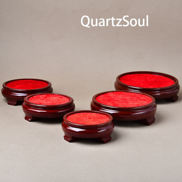 Wooden crystal ball stands in multiple sizes for displaying spheres and minerals