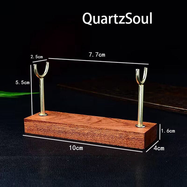 Wooden crystal sphere stand with single metal holder for displaying crystal balls