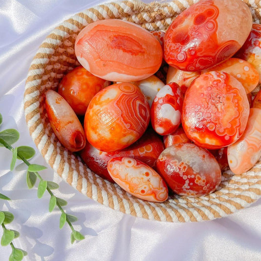 Polished Carnelian Palm Stone with vibrant orange patterns for meditation and healing