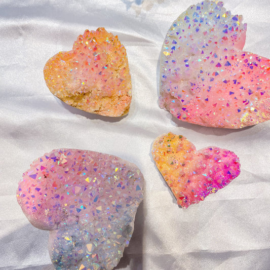 Colorful iridescent crystal hearts for healing and spiritual practice