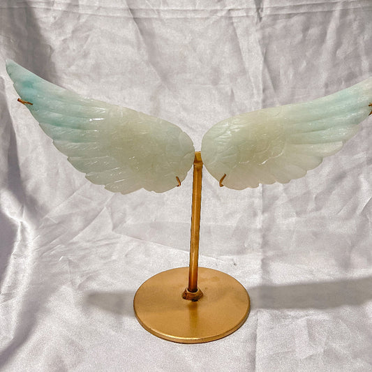 Natural jade crystal angel wings mounted on gold stand for crystal healing
