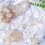 Natural Lemurian quartz crystal cluster with multiple points and horizontal striations