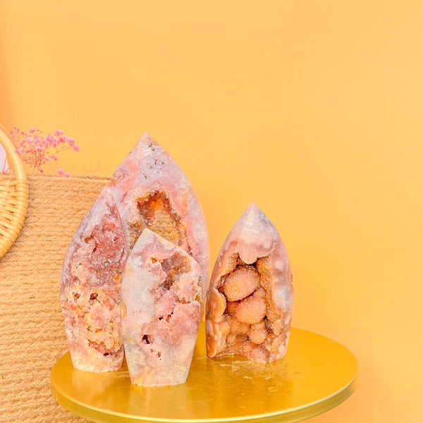 Natural pink amethyst druzy crystal point with sparkling quartz formation on gold platform