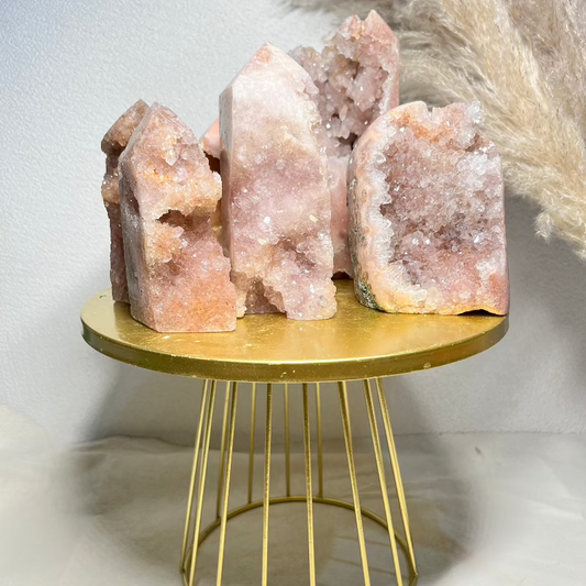 Premium pink amethyst free form wholesale crystal with natural formations on gold display stand